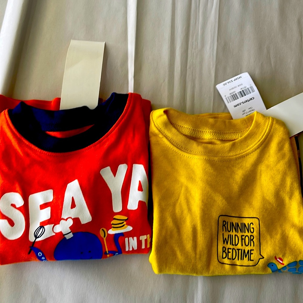 Carter’s t-shirts. Size 12m. Brand new, never worn. One yellow, one orange.